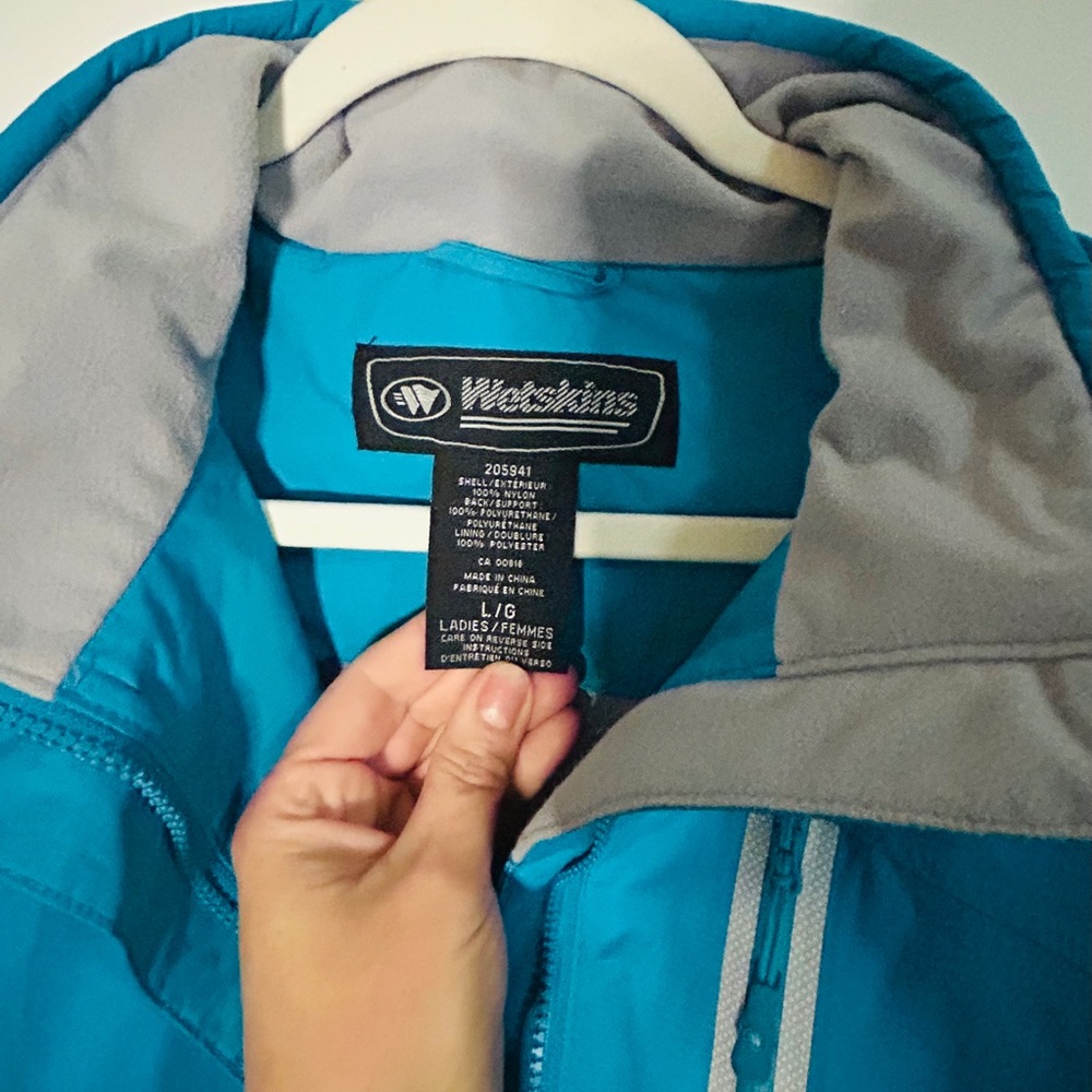 Woman’s Blue Jacket. Size large new condition